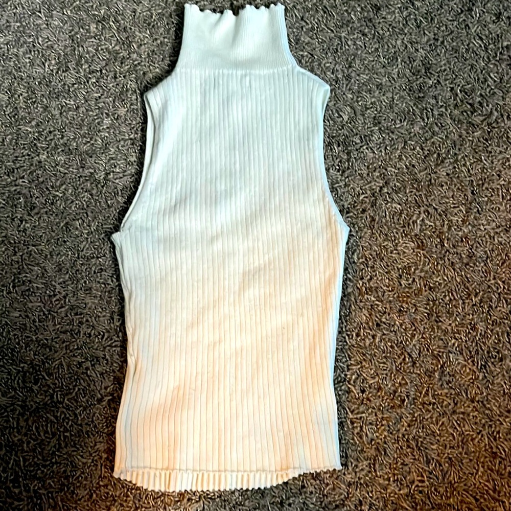 Cream, ribbed at the top.